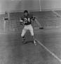 Photograph: [Football player number 24 in a football field, 2]