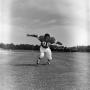 Photograph: [Football player #88, James Smith, running to the camera with arms ou…