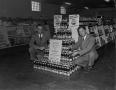 Photograph: [Two men with a Pepsi-Cola display]