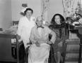 Photograph: [Two women with an elderly man]