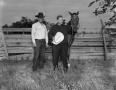 Photograph: [Ted Gouldy with a man and a horse, 1]
