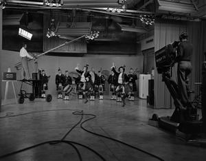 Primary view of object titled '[Scotch band performing on the Bobby Peters show]'.
