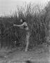 Photograph: [Woman fishing while posing as Ghost River Kid]