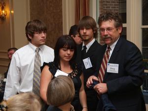 Primary view of object titled '[Doug Toney and his children attending TDNA dinner]'.