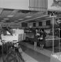 Photograph: [Bobbie Wygant in a food store]