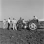 Thumbnail image of item number 1 in: '[Men standing around a Ford tractor]'.