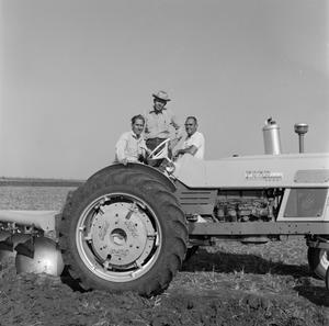 Primary view of object titled '[Tom Lewis and Etheridge Plowing]'.
