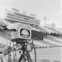 Photograph: [WBAP-TV video camera in a stadium]