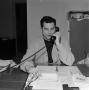Photograph: [Bill Enis on the telephone]