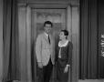Photograph: [Bobbie and man in a striped suit]