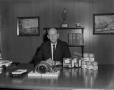 Photograph: [Man with carnation products]