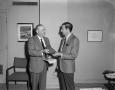 Photograph: [Mr. Bacus handing out award]