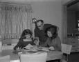 Primary view of [Gene O'Bannon with wife and daughter]