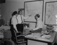 Thumbnail image of item number 1 in: '[Men in office with market survey map]'.