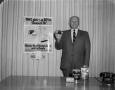 Photograph: [Man with various Minute Maid products]