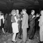 Photograph: [People socializing at a party]
