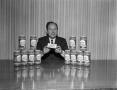 Photograph: [Man with Nestea products]