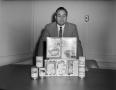 Photograph: [Tom Mitchell with products]
