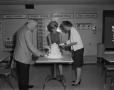 Photograph: [Roy Bacus with WBAP cake]