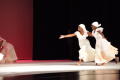 Photograph: [Photograph of two women dancing across a stage]