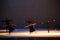 Photograph: [Photograph of five dancers dressed in black]