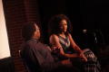 Thumbnail image of item number 1 in: '[Kimberly Elise looks toward the ground while talking to Curtis King]'.