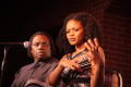 Primary view of [Curtis King and Kimberly Elise look to their left]