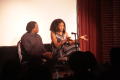 Photograph: [Curtis King and Kimberly Elise sit on stage]