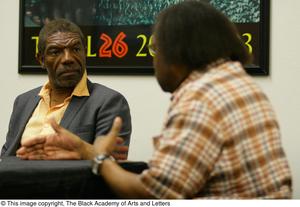 Primary view of object titled '[Vondie Curtis Hall stares at Curtis King]'.