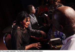 Primary view of object titled '[Pam Grier and Curtis King chat with the audience]'.
