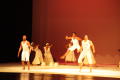 Photograph: [Photograph of seven individuals dancing on a stage]