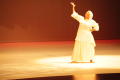 Photograph: [Photograph of a woman performing at a dance festival]