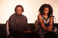 Primary view of [Kimberly Elise and Curtis King look right while sitting]