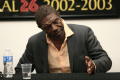 Thumbnail image of item number 1 in: '[Vondie Curtis Hall puts hand on table]'.