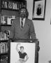 Photograph: [Photograph of Abner Haynes posing with painting of daughter]