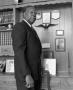 Photograph: [Photograph of Dr. Norman E. Dyer in his home office]