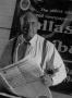 Thumbnail image of item number 1 in: '[Samuel Wick holding The Dallas Post Tribune #2]'.
