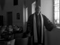 Photograph: [Reverend J. D. Mooring Posing at Window, 2]