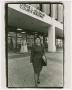 Photograph: [Barbara Rosenberg in front of court building]