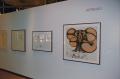 Photograph: [Photograph of an African gallery wall, featuring four art pieces]