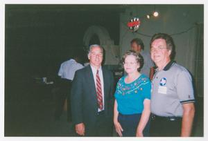 Primary view of object titled '[Photo of Howard Dean with two individuals]'.