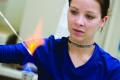 Photograph: [Student working with Bunsen Burner]