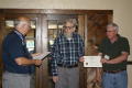 Photograph: [TXSSAR Arlington chapter members passing out certificates]