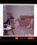 Photograph: [Photograph of a woman and a baby during Easter, 2]