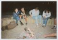 Photograph: [Photograph of TAMS students near campfire]
