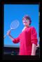 Photograph: [Carol Posing with a Tennis Racquet]