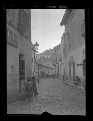 Primary view of object titled '[View down a street in Mexico]'.