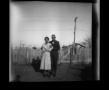 Photograph: [Byrd Williams Jr. and his wife Irene in a backyard]
