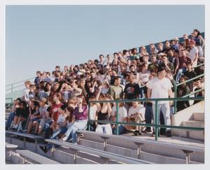 Primary view of object titled '[Photograph of TAMS students moving on UNT bleachers]'.
