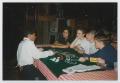 Photograph: [Photograph of TAMS students with student croupier]